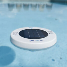 A solar pool ionizer floating in a pool.