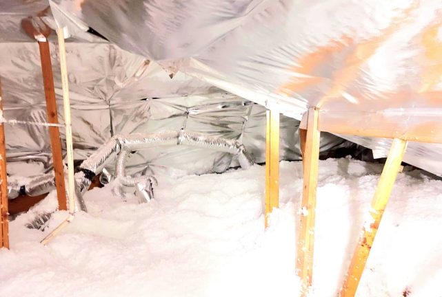 An attic after being insulated.
