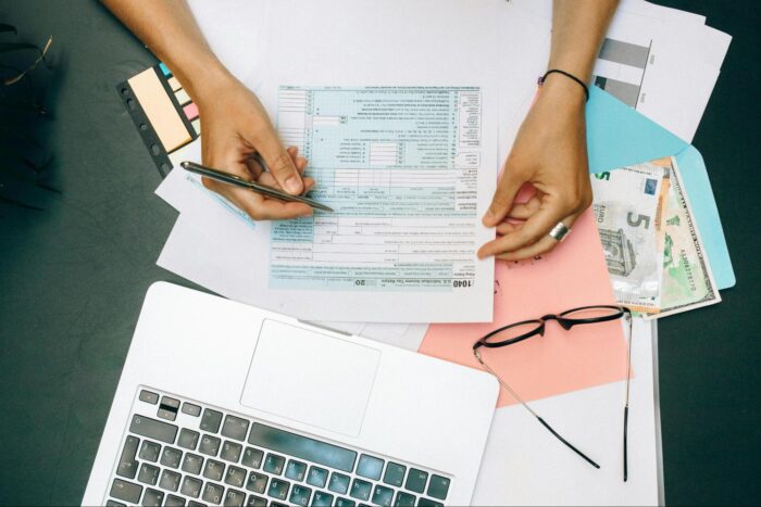An accountant analyzes tax documents – Remington Solar