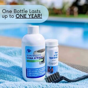 Sun Shock Soak & Rinse with accessories, on a blue pool towel, with the words "One Bottle Lasts up to ONE YEAR!"